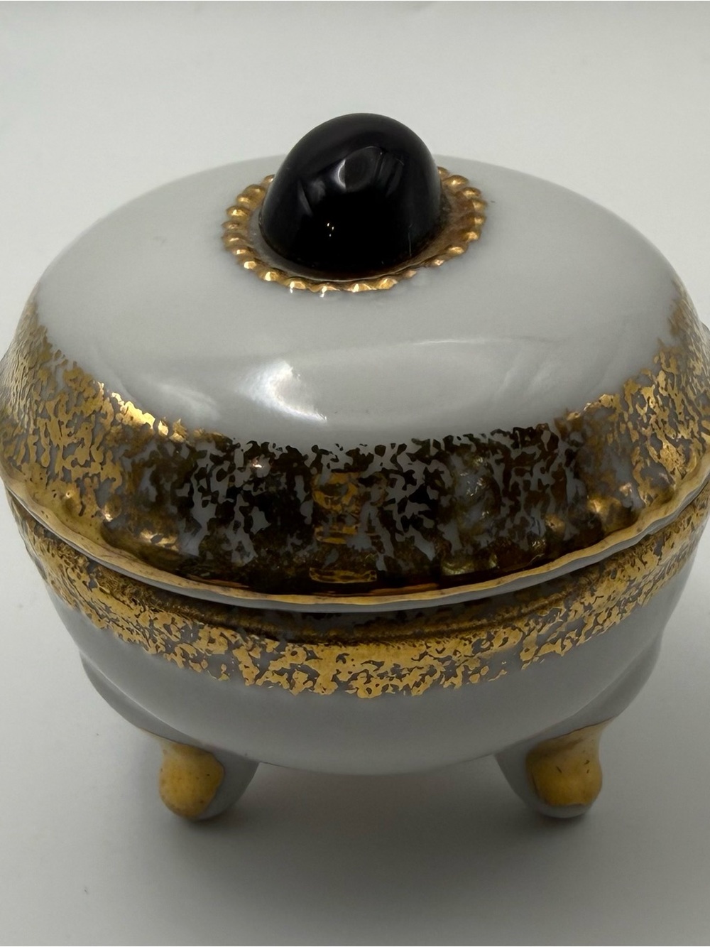 Source Unknown White Ceramic Trinket Box with Gold Accents and Black Knob